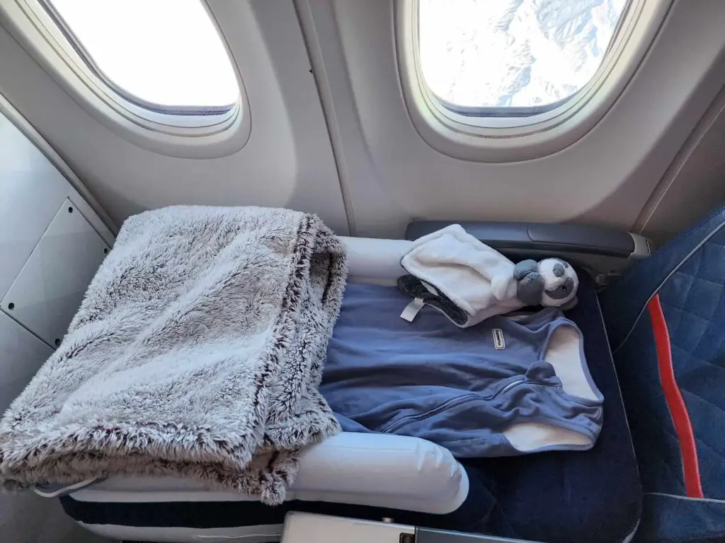Flying with a baby blow up bed set up for plane