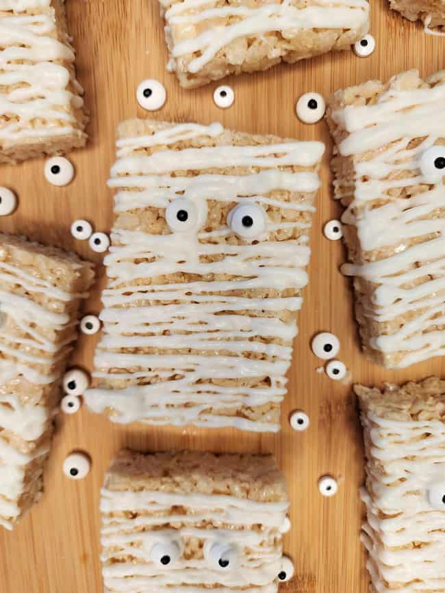 Mummy rice krispie treats are a fun and easy Halloween treat.