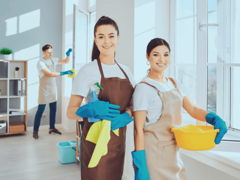 Friends ready to clean a new mom's home for her nesting party baby shower