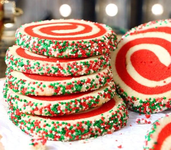 Christmas pinwheel sugar cookies with red and green swirls, soft and buttery holiday cookies perfect for family baking or cookie exchanges.