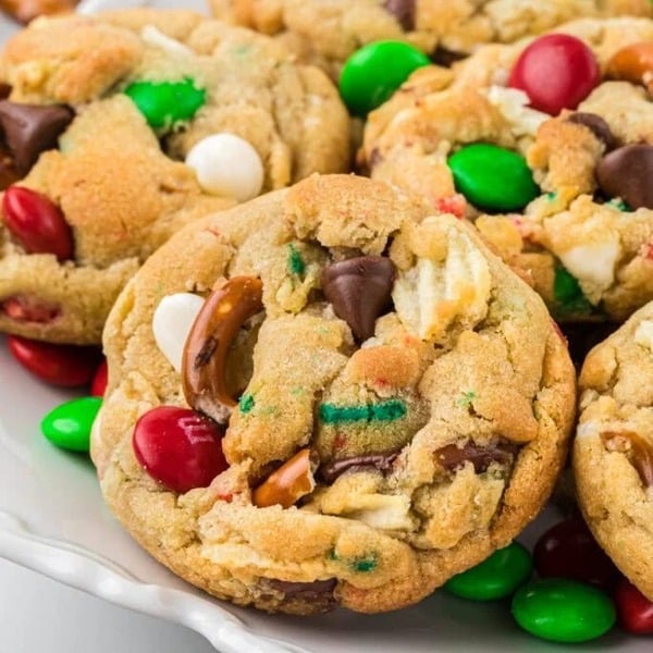 Kitchen Sink Christmas Cookies with red and green M&Ms, potato chips, pretzels, and chocolate chips, a soft and chewy holiday cookie for kids.