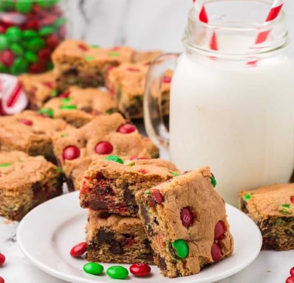 Christmas M&M cookie bars with red and green candies, a soft and chewy one-pan holiday dessert for kids and families.