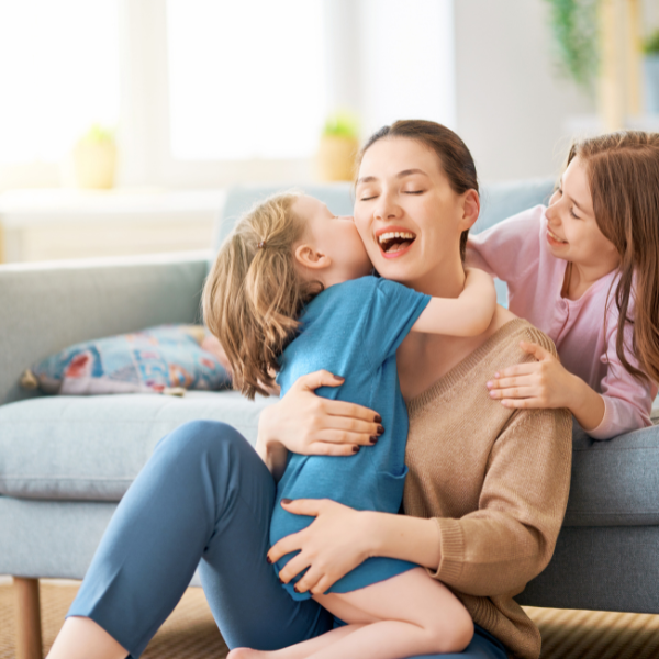 A mom spending time with her two young kids, capturing the heart of motherhood and everyday family life.