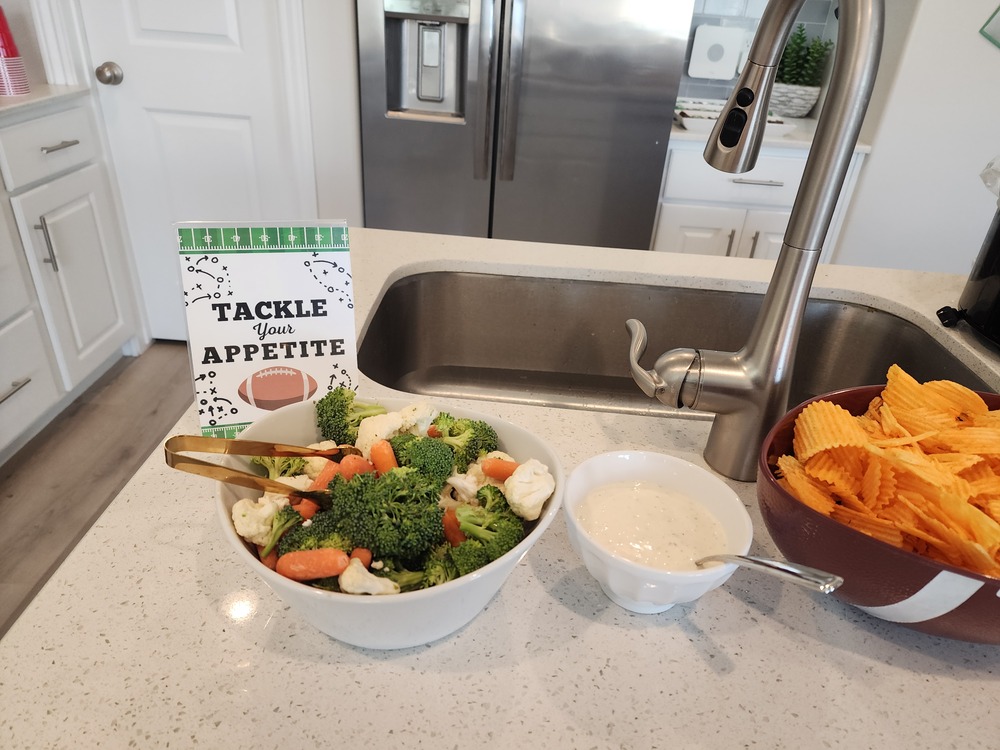 Close-up of additional football-themed party food, featuring game-day inspired snacks displayed for the “First Year Down” party.